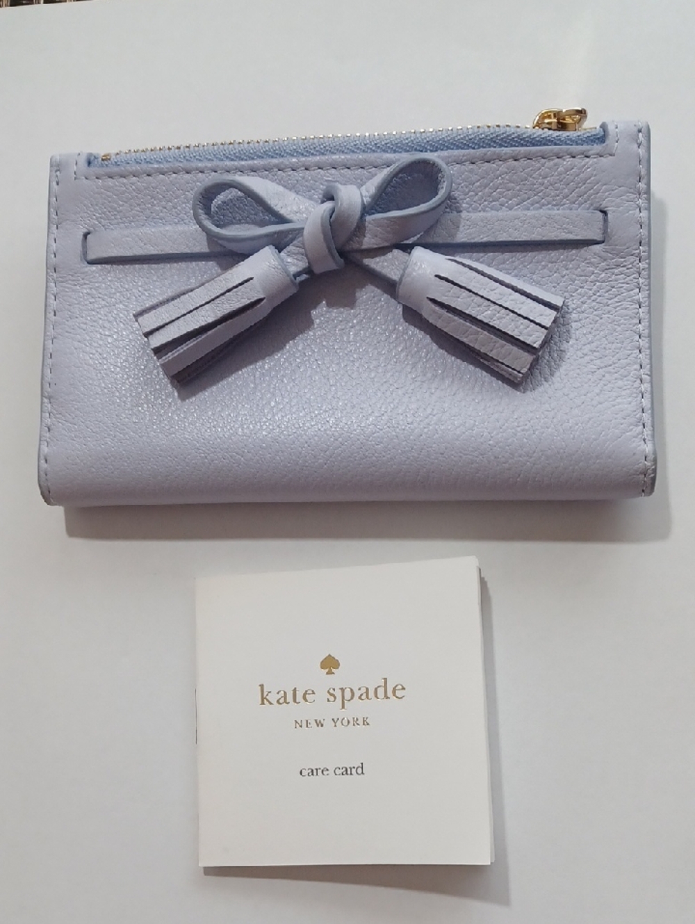 NWOT kate spade Light Lavender Tassel Bow Wallet. Full Price Retail NOT Outlet